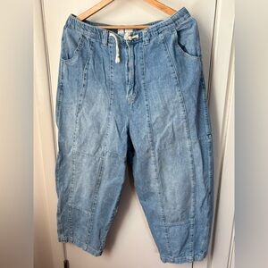 Free People Barrel Jeans drawstring and zipper. 
Faded blue